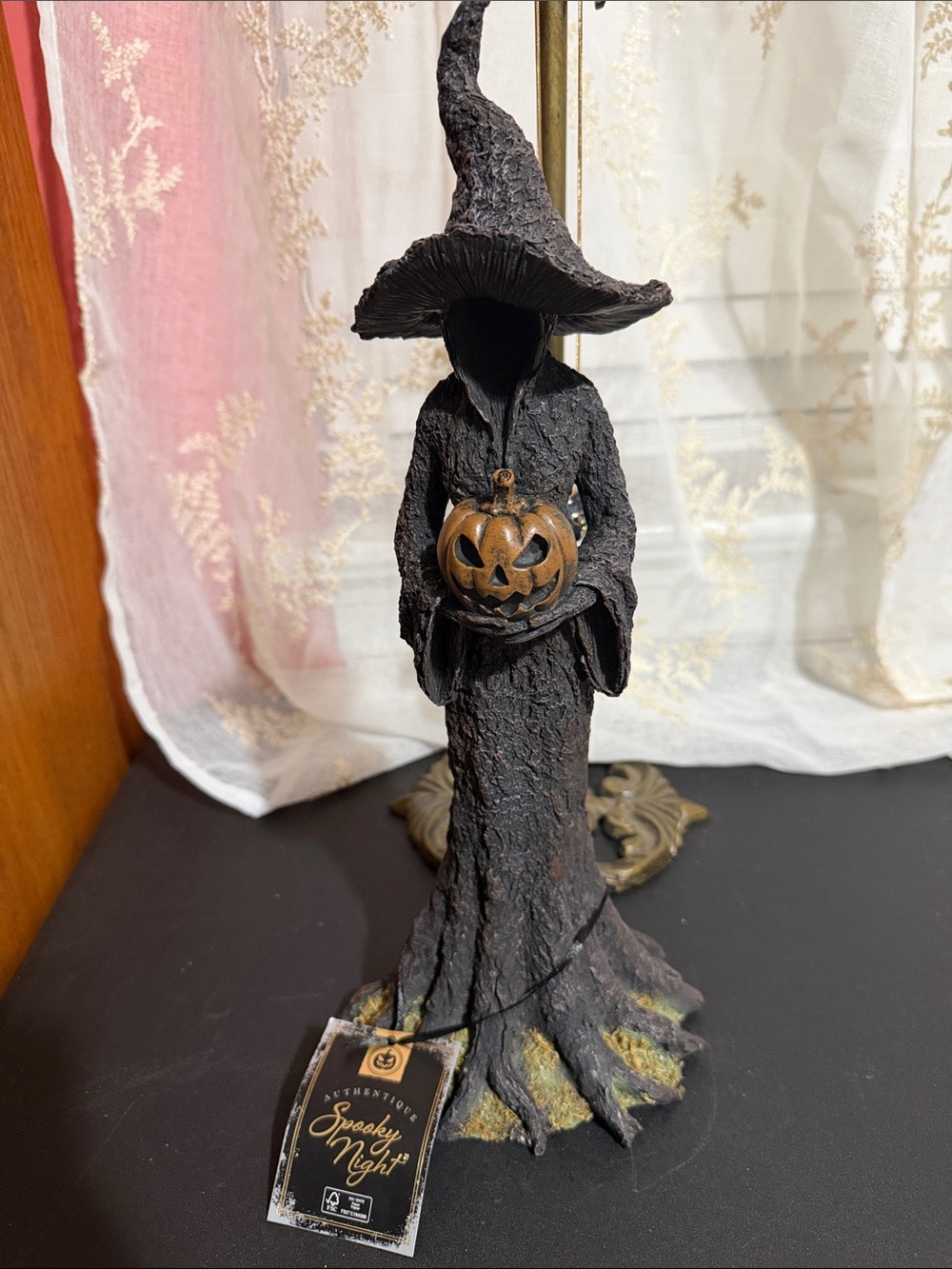 Spooky Night witch with pumpkin decor